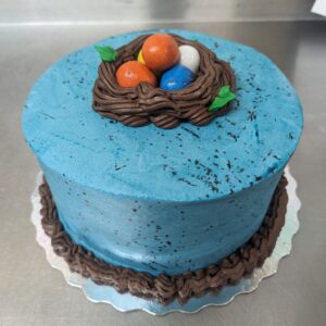 Easter Robin's Egg Cake 9" serves 6-10 (chocolate cake, oreo buttercream filling, vanilla buttercream icing)